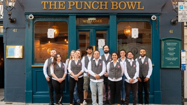 Punch bowl staff outside pub butcombe