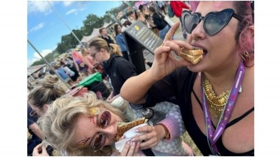 Tuck in: Ayesha Kalaji (right) found amazing food at the huge music festival