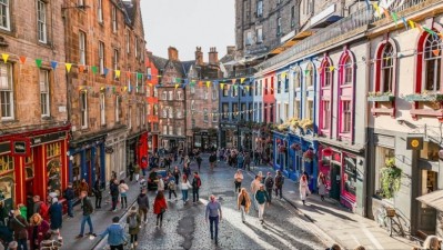 Huge boost: Venues in Edinburgh (Pictured: Victoria Street) prepare for a busy August (Credit:Getty/Guven Ozdemir)